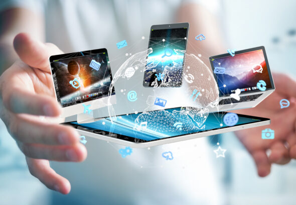 Businessman connecting tech devices to each other 3D rendering